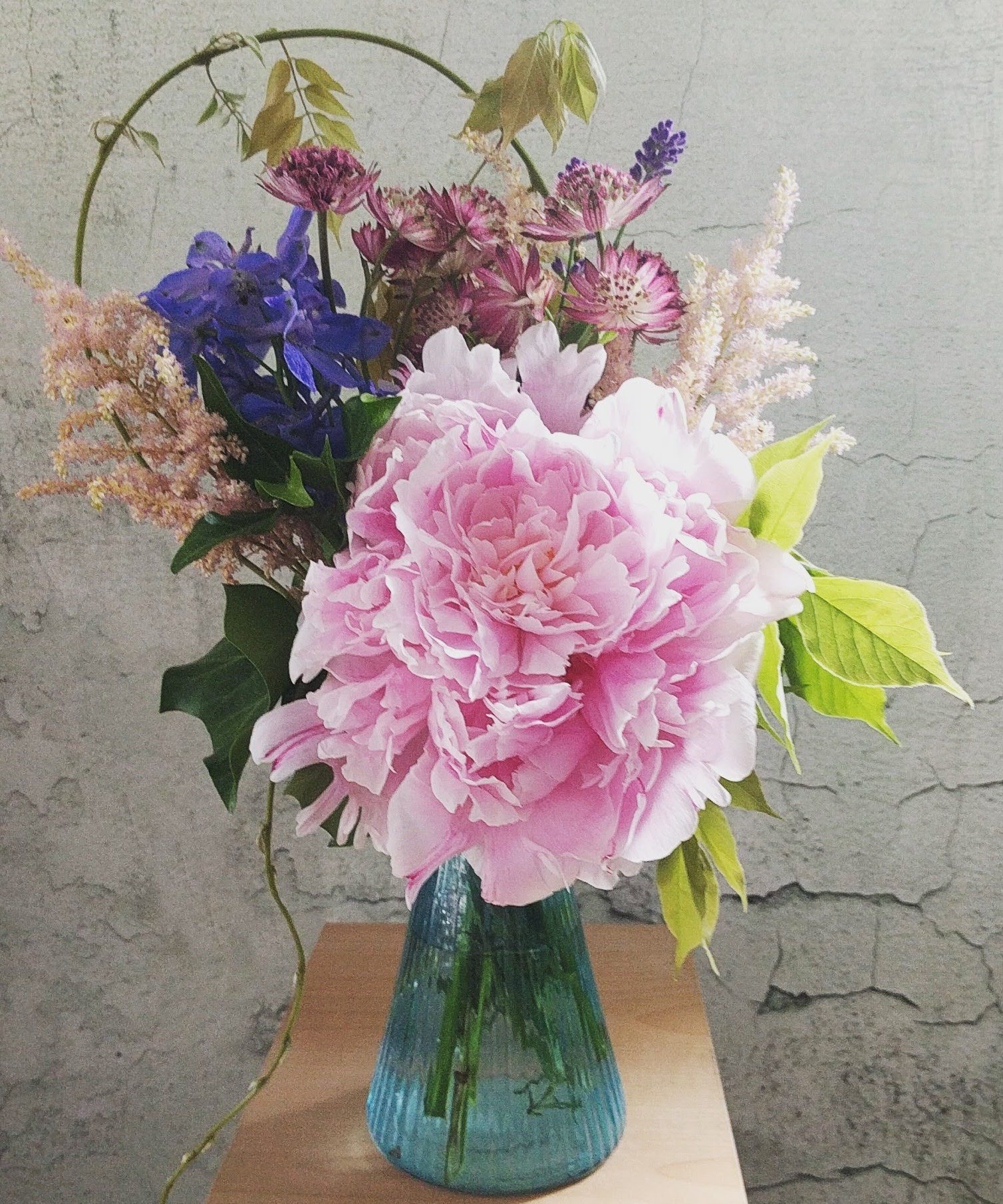 A lush, bountiful bouquet with rich foliage